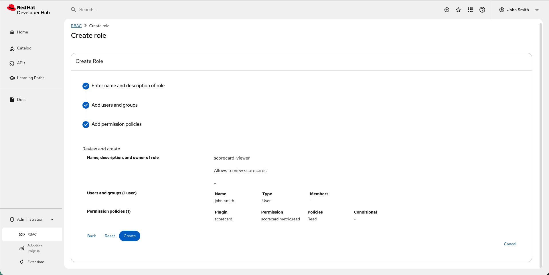 The RBAC UI showing the scorecard.metric.read permission selected for a role.